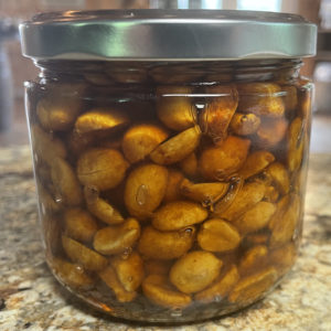 Honey Roasted Peanuts in a jar of Honey